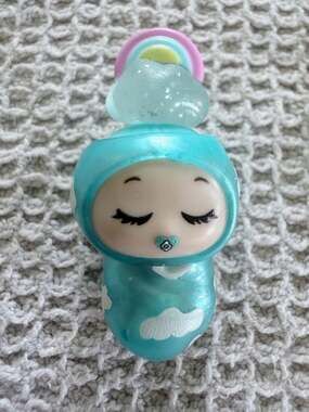 Skyrocket Blume Baby Pop Secret Nursery Baby Figure with Cloud Swaddle and Rainb
